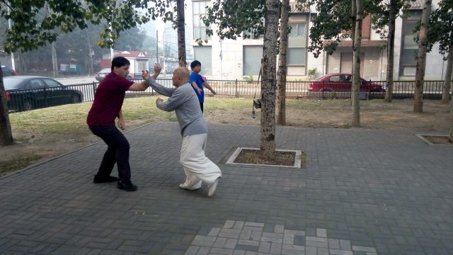 Wang Deli and Paul Frost practicing Jiu Tao Huan